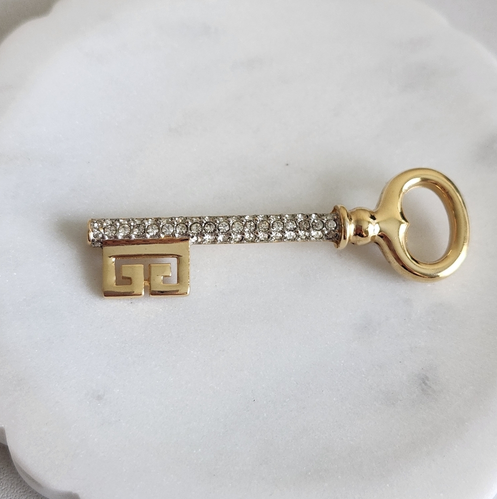 Givenchy Gold Tone Key Brooch with Crystal Accents